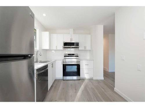 5137 17 Avenue Nw, Calgary, AB - Indoor Photo Showing Kitchen With Stainless Steel Kitchen