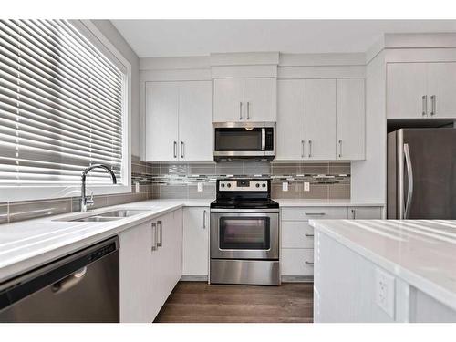 222 Redstone Crescent North, Calgary, AB - Indoor Photo Showing Kitchen With Double Sink