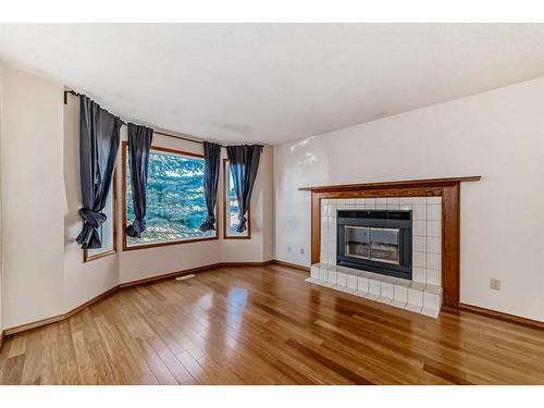 1010 13 Street Se, High River, AB - Indoor Photo Showing Living Room With Fireplace