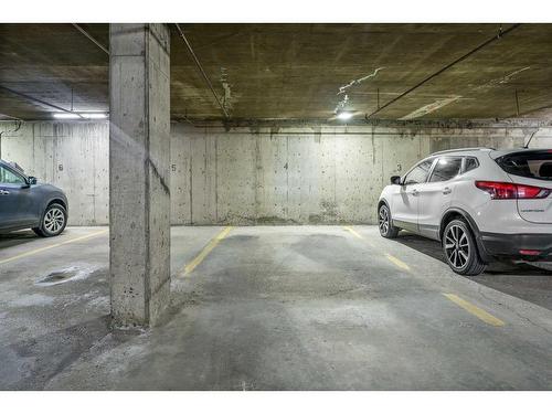 207-3730 50 Street Nw, Calgary, AB - Indoor Photo Showing Garage