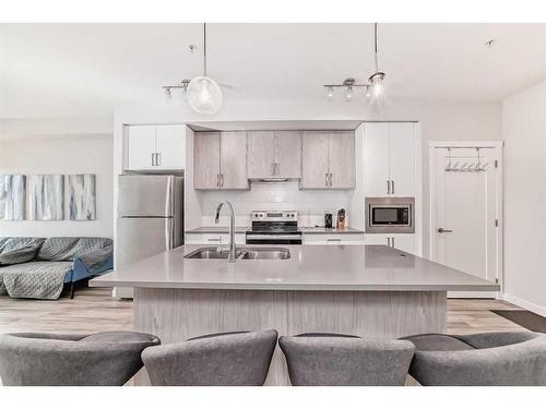 305-138 Sage Valley Common Nw, Calgary, AB - Indoor Photo Showing Kitchen With Double Sink With Upgraded Kitchen