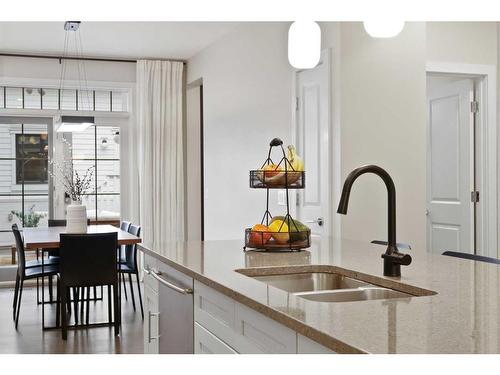 153 Burma Star Road Sw, Calgary, AB - Indoor Photo Showing Kitchen With Double Sink