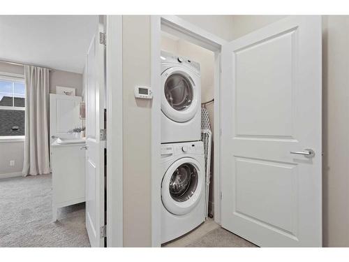 153 Burma Star Road Sw, Calgary, AB - Indoor Photo Showing Laundry Room