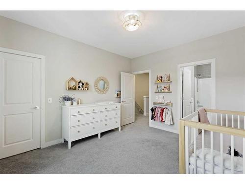 153 Burma Star Road Sw, Calgary, AB - Indoor Photo Showing Bedroom