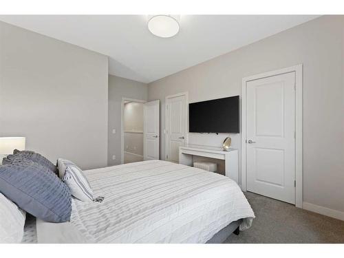 153 Burma Star Road Sw, Calgary, AB - Indoor Photo Showing Bedroom