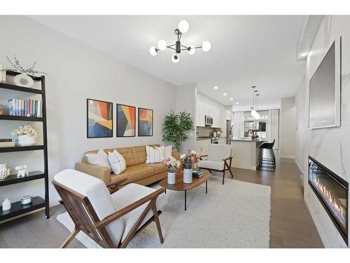 153 Burma Star Road Sw, Calgary, AB - Indoor Photo Showing Living Room