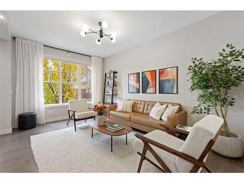 153 Burma Star Road Sw, Calgary, AB - Indoor Photo Showing Living Room