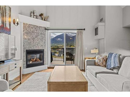 401-901 Mountain Street, Canmore, AB - Indoor Photo Showing Living Room With Fireplace