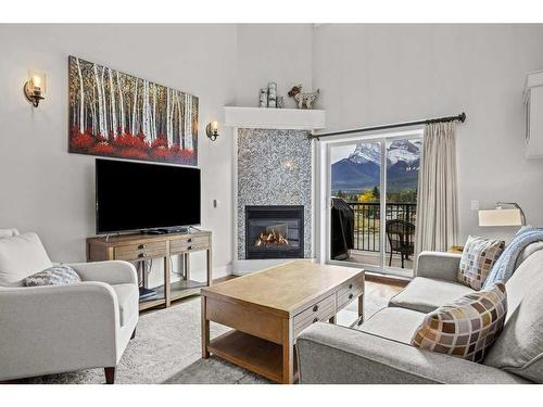 401-901 Mountain Street, Canmore, AB - Indoor Photo Showing Living Room With Fireplace