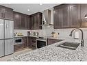 401-901 Mountain Street, Canmore, AB  - Indoor Photo Showing Kitchen With Double Sink With Upgraded Kitchen 