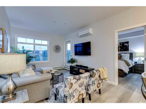 3208-3727 Sage Hill Drive Nw, Calgary, AB - Indoor Photo Showing Living Room