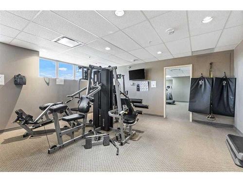 802-1053 10 Street Sw, Calgary, AB - Indoor Photo Showing Gym Room