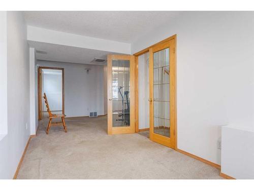 220 Hawksbrow Drive, Calgary, AB - Indoor Photo Showing Other Room