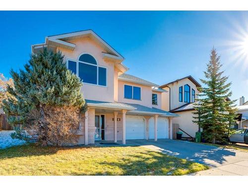 220 Hawksbrow Drive, Calgary, AB - Outdoor With Deck Patio Veranda With Facade