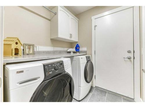 176 Cove Crescent, Chestermere, AB - Indoor Photo Showing Laundry Room