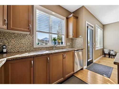 346 Fireside Place, Cochrane, AB - Indoor Photo Showing Kitchen With Double Sink