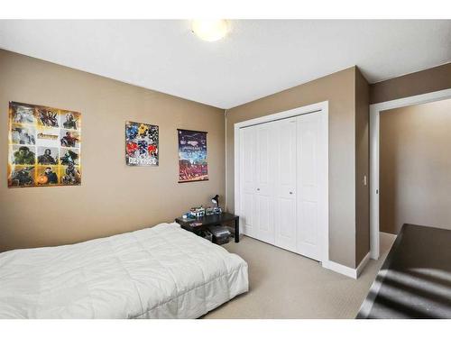 346 Fireside Place, Cochrane, AB - Indoor Photo Showing Bedroom