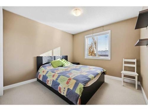 346 Fireside Place, Cochrane, AB - Indoor Photo Showing Bedroom