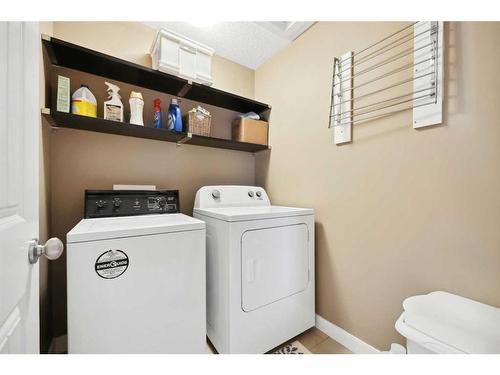 346 Fireside Place, Cochrane, AB - Indoor Photo Showing Laundry Room