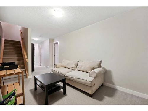 346 Fireside Place, Cochrane, AB - Indoor Photo Showing Living Room