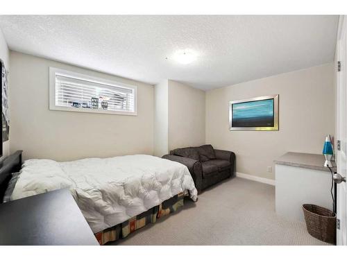 346 Fireside Place, Cochrane, AB - Indoor Photo Showing Bedroom