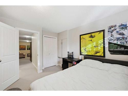 346 Fireside Place, Cochrane, AB - Indoor Photo Showing Bedroom