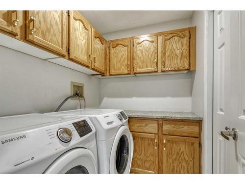 215 Hawkstone Close Nw, Calgary, AB - Indoor Photo Showing Laundry Room