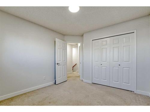 215 Hawkstone Close Nw, Calgary, AB - Indoor Photo Showing Other Room