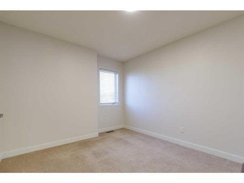 215 Hawkstone Close Nw, Calgary, AB - Indoor Photo Showing Other Room