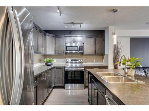 308 Redstone View Ne, Calgary, AB - Indoor Photo Showing Kitchen With Stainless Steel Kitchen With Double Sink With Upgraded Kitchen