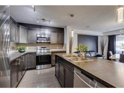 308 Redstone View Ne, Calgary, AB - Indoor Photo Showing Kitchen With Stainless Steel Kitchen With Double Sink