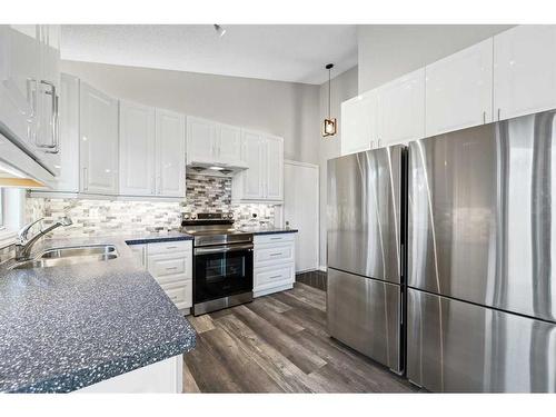 100 Ranch Estates Drive Nw, Calgary, AB - Indoor Photo Showing Kitchen With Stainless Steel Kitchen With Upgraded Kitchen