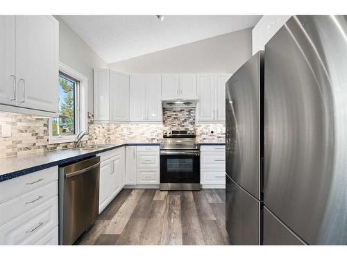 100 Ranch Estates Drive Nw, Calgary, AB - Indoor Photo Showing Kitchen With Stainless Steel Kitchen With Upgraded Kitchen