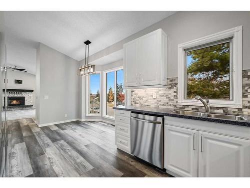 100 Ranch Estates Drive Nw, Calgary, AB - Indoor Photo Showing Kitchen With Double Sink