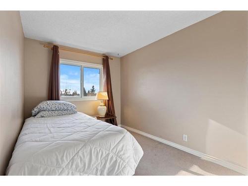 12 Falconer Terrace Ne, Calgary, AB - Indoor Photo Showing Bedroom