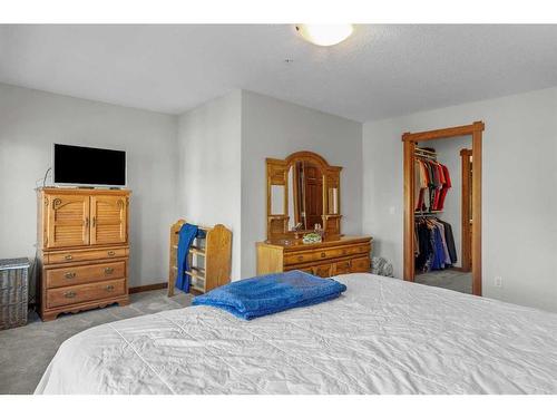 202-150 Crossbow Place, Canmore, AB - Indoor Photo Showing Bedroom