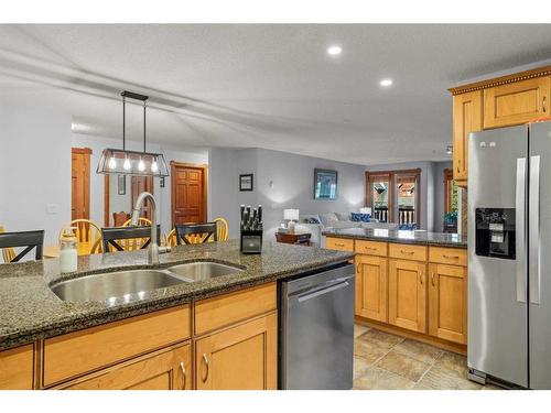 202-150 Crossbow Place, Canmore, AB - Indoor Photo Showing Kitchen With Double Sink