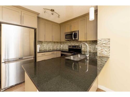 6109-155 Skyview Ranch Way Ne, Calgary, AB - Indoor Photo Showing Kitchen With Stainless Steel Kitchen With Double Sink