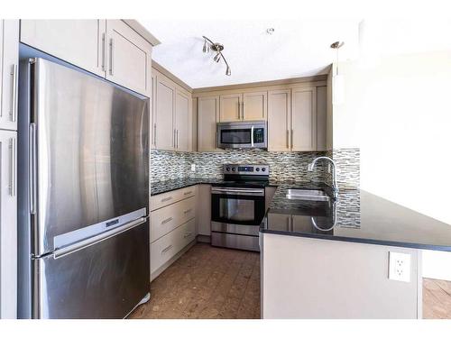 6109-155 Skyview Ranch Way Ne, Calgary, AB - Indoor Photo Showing Kitchen With Stainless Steel Kitchen With Upgraded Kitchen