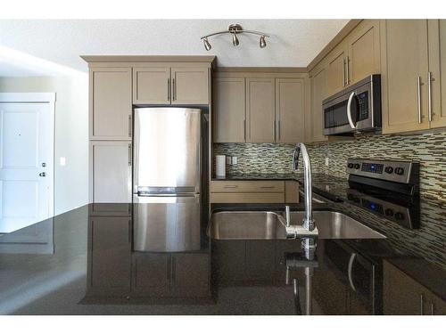 6109-155 Skyview Ranch Way Ne, Calgary, AB - Indoor Photo Showing Kitchen With Stainless Steel Kitchen With Double Sink