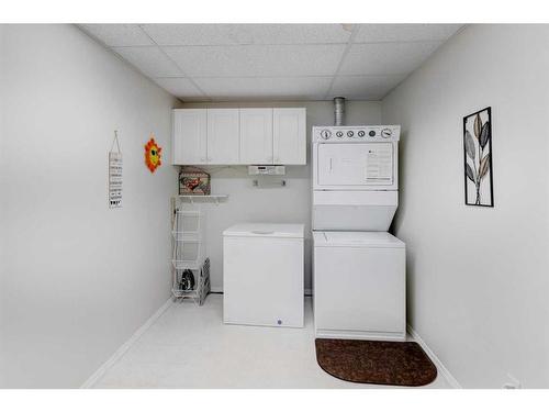 327-728 Country Hills Road Nw, Calgary, AB - Indoor Photo Showing Laundry Room