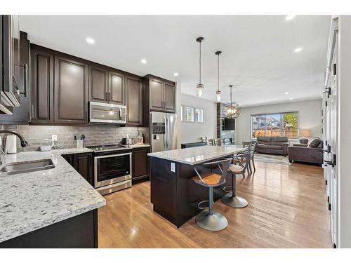 241 Mahogany Parade Se, Calgary, AB - Indoor Photo Showing Kitchen With Stainless Steel Kitchen With Double Sink With Upgraded Kitchen