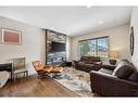 241 Mahogany Parade Se, Calgary, AB  - Indoor Photo Showing Living Room With Fireplace 