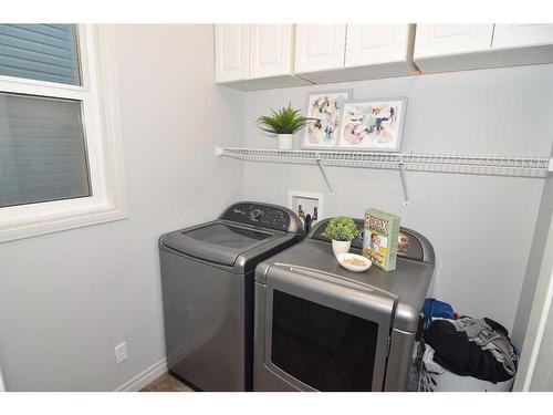 431 Hillcrest Circle Sw, Airdrie, AB - Indoor Photo Showing Laundry Room