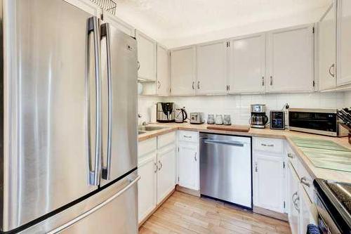 93-200 Shawnessy Drive Sw, Calgary, AB - Indoor Photo Showing Kitchen With Stainless Steel Kitchen