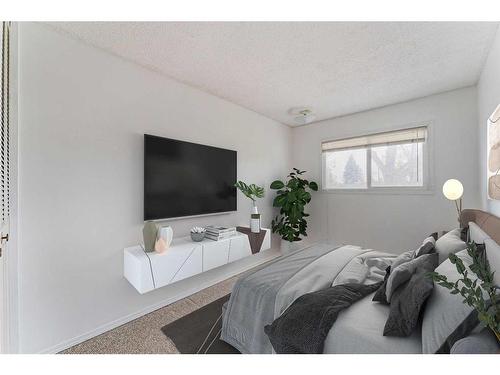 216-15403 Deer Run Drive Se, Calgary, AB - Indoor Photo Showing Bedroom