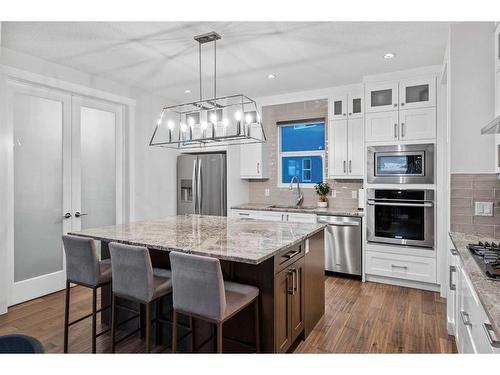 219 Kinniburgh Place, Chestermere, AB - Indoor Photo Showing Kitchen With Stainless Steel Kitchen With Upgraded Kitchen