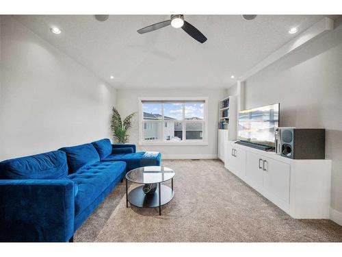 219 Kinniburgh Place, Chestermere, AB - Indoor Photo Showing Living Room