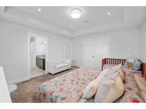 219 Kinniburgh Place, Chestermere, AB - Indoor Photo Showing Bedroom