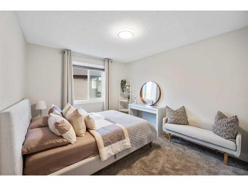 219 Kinniburgh Place, Chestermere, AB - Indoor Photo Showing Bedroom